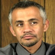 Man with dark hair and graying temples